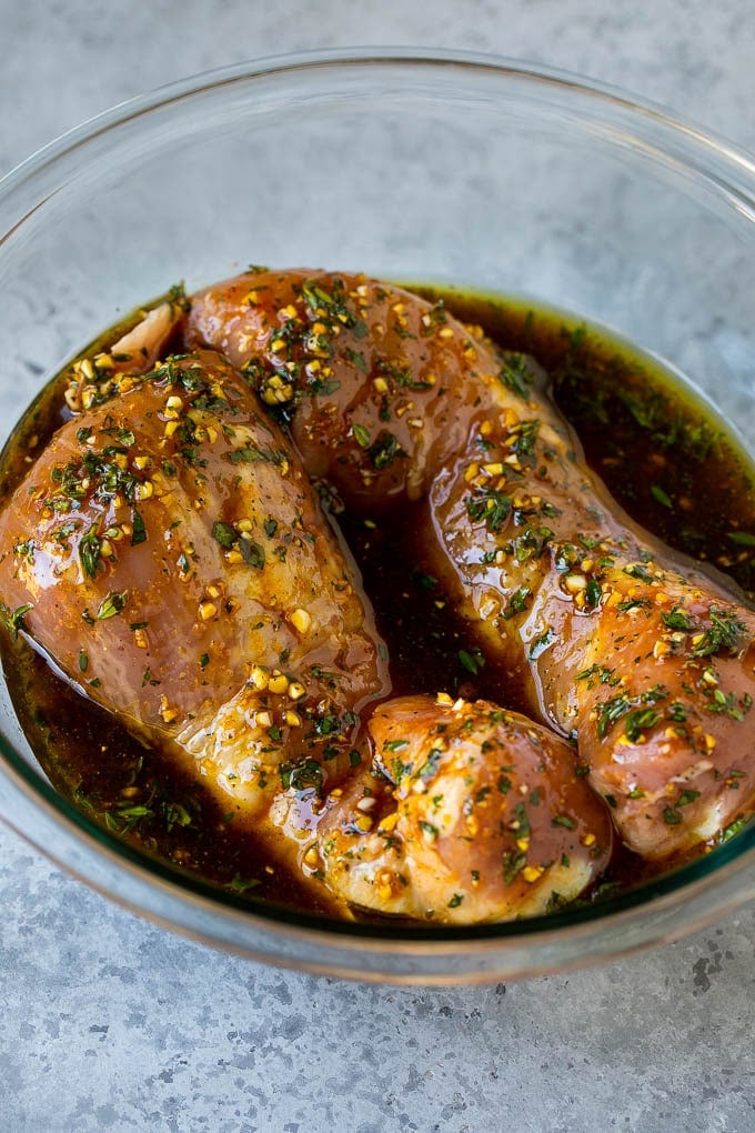 Marinated Pork Tenderloin Recipe | Pork Tenderloin Marinade | Pork Marinade #pork #porktenderloin #marinade #dinner #grilling #edsug Pork tenderloins in a bowl of marinade.
