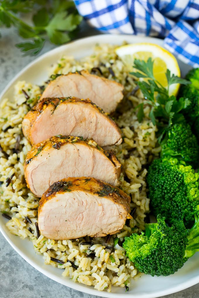 Marinated Pork Tenderloin Recipe | Pork Tenderloin Marinade | Pork Marinade #pork #porktenderloin #marinade #dinner #grilling #edsug Pork tenderloin marinade over sliced pork, served with rice and broccoli.
