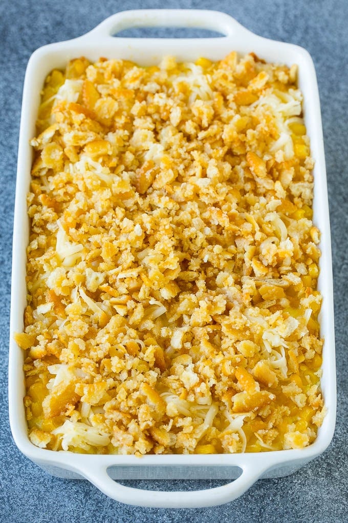 Scalloped Corn | Corn Casserole #corn #casserole #cheese #sidedish #dinner #edsug Scalloped corn topped with crushed crackers and shredded cheese.