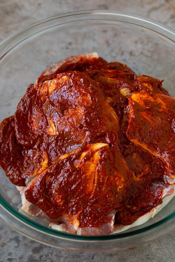 Tacos al Pastor Recipe | Pork Tacos | Mexican Tacos #tacos #pork #pineapple #grilling #tacotuesday #dinner #edsug Sliced pork shoulder coated in a chile based marinade.