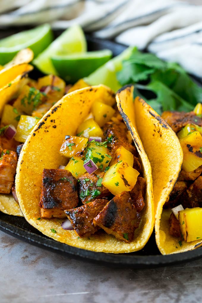 Tacos al Pastor Recipe | Pork Tacos | Mexican Tacos #tacos #pork #pineapple #grilling #tacotuesday #dinner #edsug Tacos al pastor stuffed with grilled pork, pineapple, red onion and cilantro.