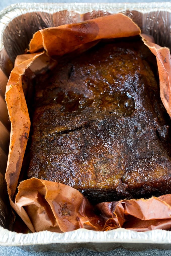 Smoked Brisket Recipe | Beef Brisket | BBQ Beef #brisket #smoker #beef #bbq #dinner #edsug Beef brisket inside butcher paper.