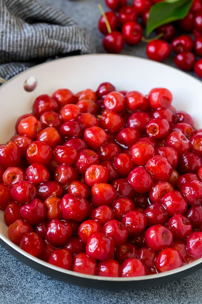 Cherry Pie Filling Recipe #pie #cherries #dessert #sweets #edsug #summer Cooked cherries in a skillet.