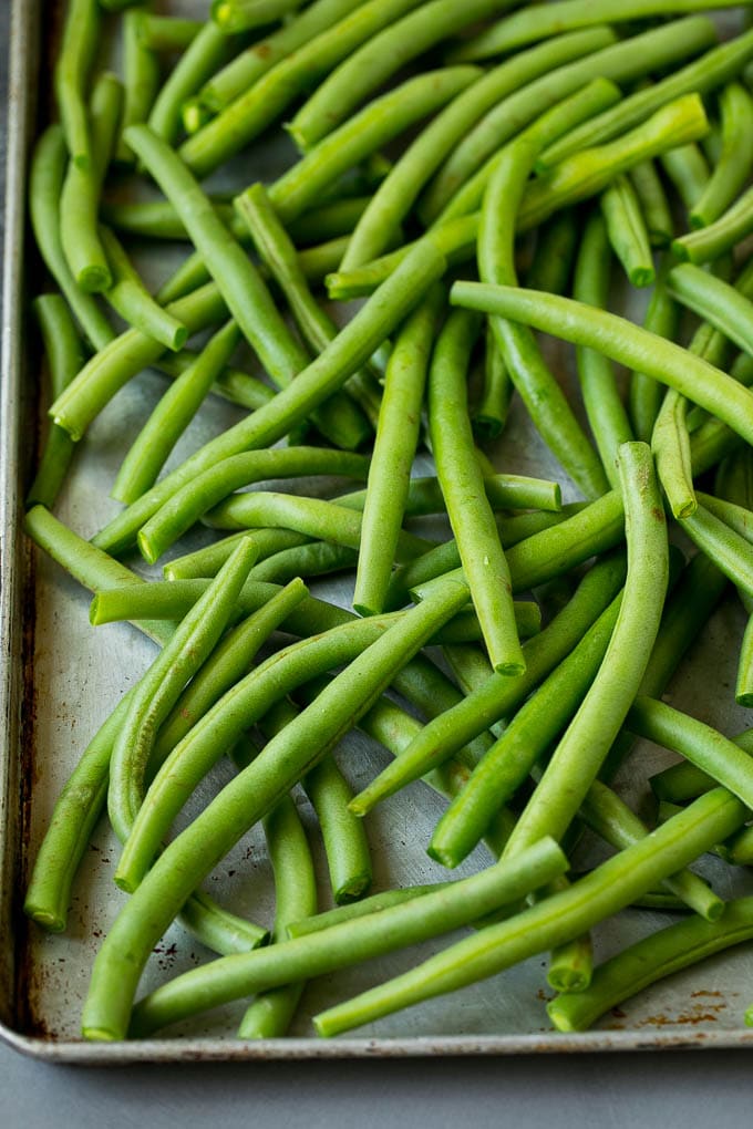 Fried Green Beans Recipe | Green Beans #greenbeans #appetizer #snack #edsug Green beans on a sheet pan.
