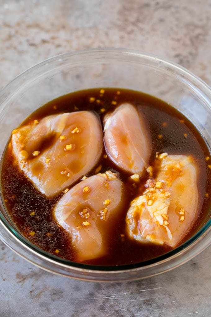 Huli Huli Chicken Recipe | Hawaiian Chicken | Grilled Chicken Thighs #chicken #pineapple #grilling #dinner #edsug Chicken thighs in a bowl of marinade.