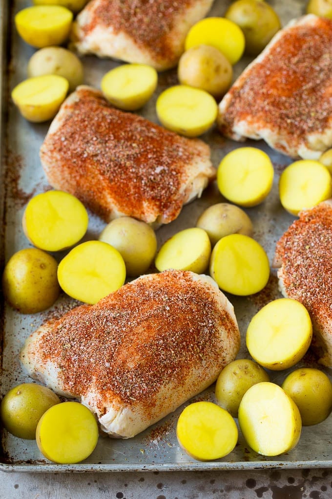 Spanish Chicken Recipe | Sheet Pan Meal | Chicken and Potatoes #spanishfood #chicken #sausage #potatoes #dinner #edsug Thighs coated in spices with small Yukon golds.