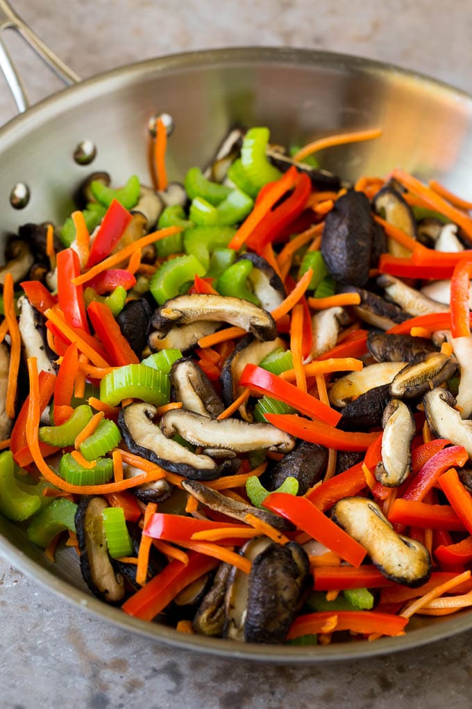 Stir Fry Noodles Recipe | Noodle Stir Fry #chicken #noodles #stirfry #mushrooms #dinner #edsug Mushrooms, bell pepper, celery and carrot in a pan.