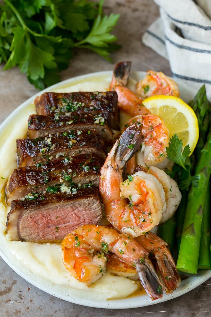 Surf and Turf Recipe | Seared Steak #steak #shrimp #keto #lowcarb #dinner #edsug Surf and turf with steak, shrimp, mashed potatoes and asparagus.