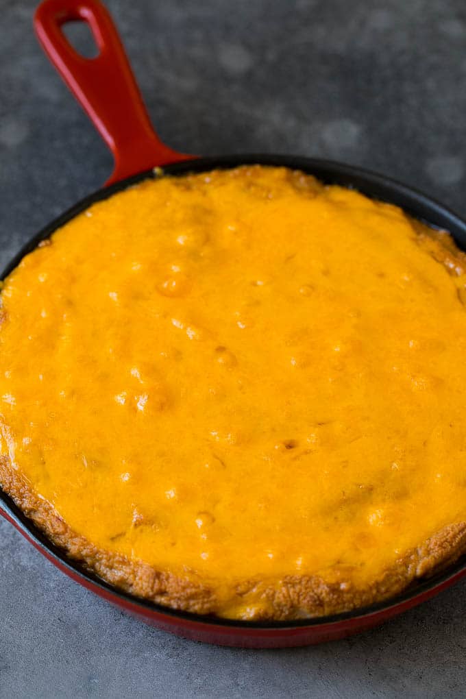 Bean Dip Recipe | Mexican Dip #dip #appetizer #mexicanfood #beans #cheese #edsug Baked refried beans topped with melted cheddar cheese.