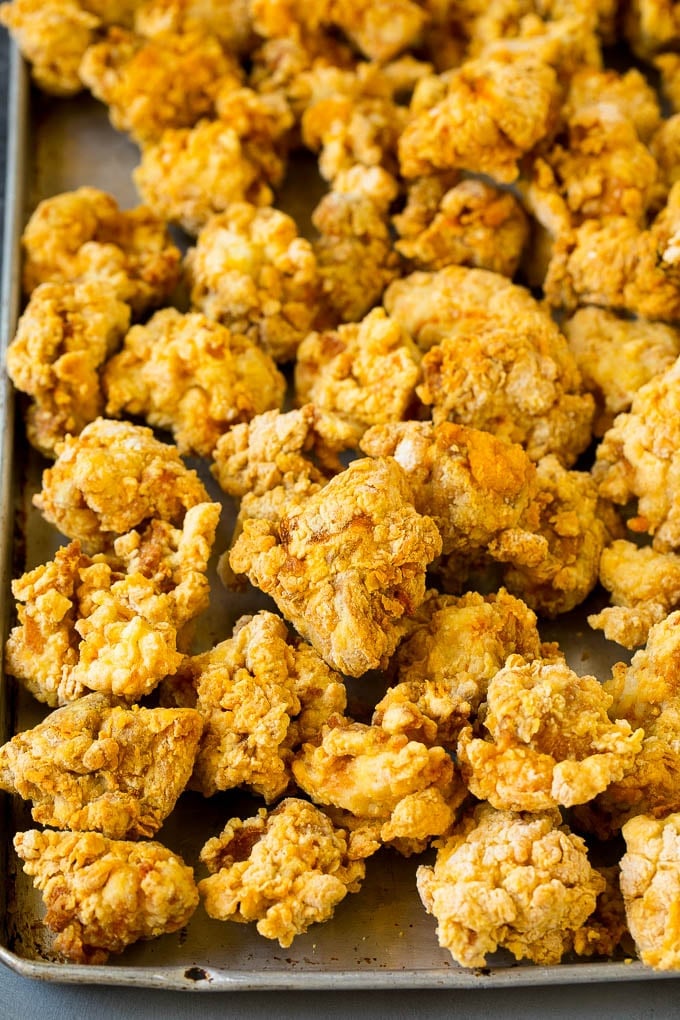 General Tso's Chicken Recipe #chicken #asianfood #dinner #edsug #copycatrecipe Breaded and fried chicken thigh pieces.
