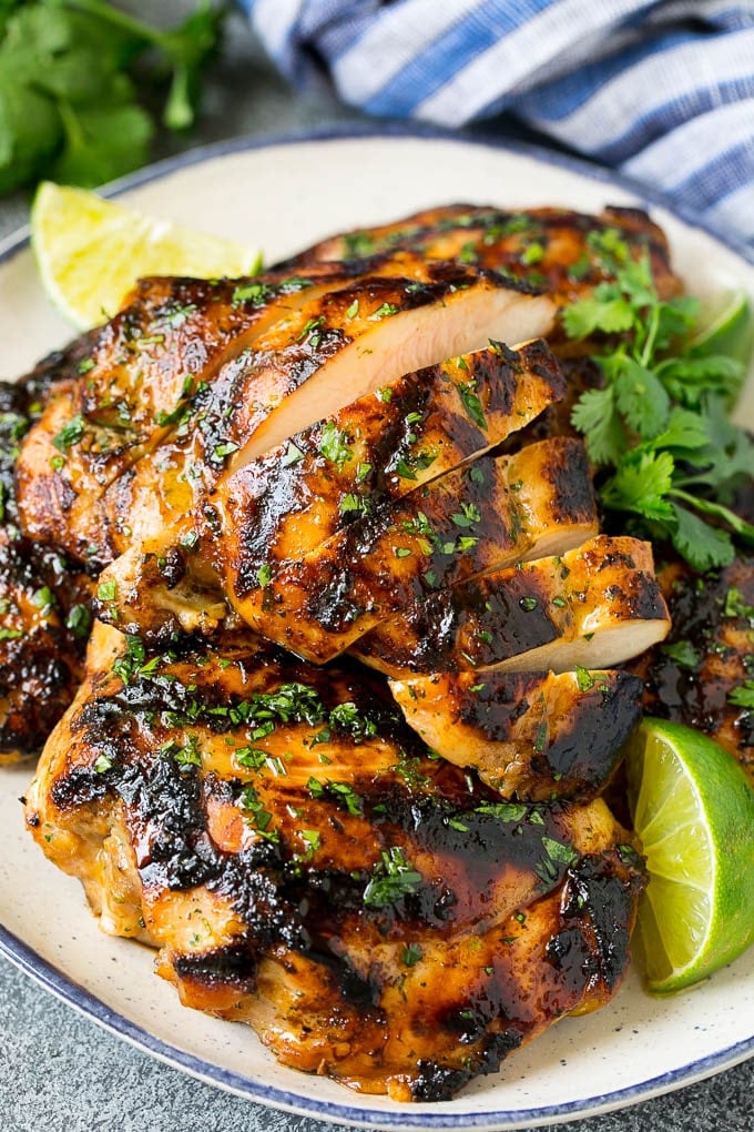 Grilled Chicken Thighs Recipe | Marinated Chicken Thighs #chicken #grilling #marinade #dinner #cilantro #lime #edsug Sliced grilled chicken thighs with cilantro and lime flavoring.