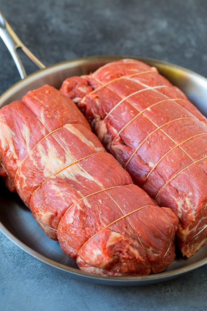 Beef Tenderloin with Garlic Butter #beef #steak #dinner #edsug Beef tenderloin roasts tied with twine.