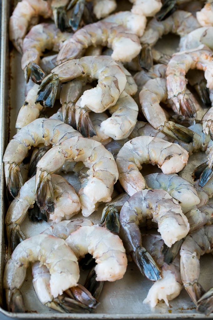 Fried Shrimp Recipe #shrimp #seafood #dinner #appetizer #edsug Raw shrimp on a sheet pan.