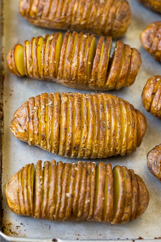 Hasselback Potatoes Recipe #potatoes #bacon #sidedish #cheese #dinner #edsug Roasted thinly sliced potatoes.