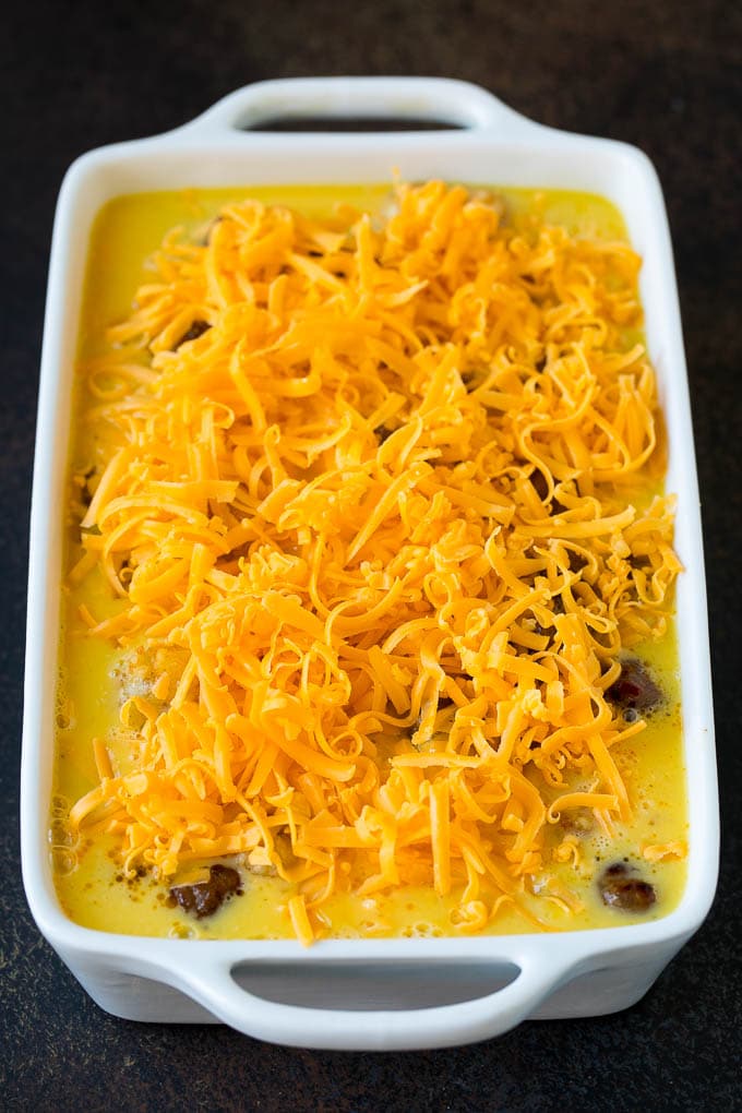 Sausage Egg Casserole Recipe | Egg Casserole #eggs #sausage #potato #cheese #casserole #breakfast #brunch #edsug An unbaked egg casserole ready to go into the oven.