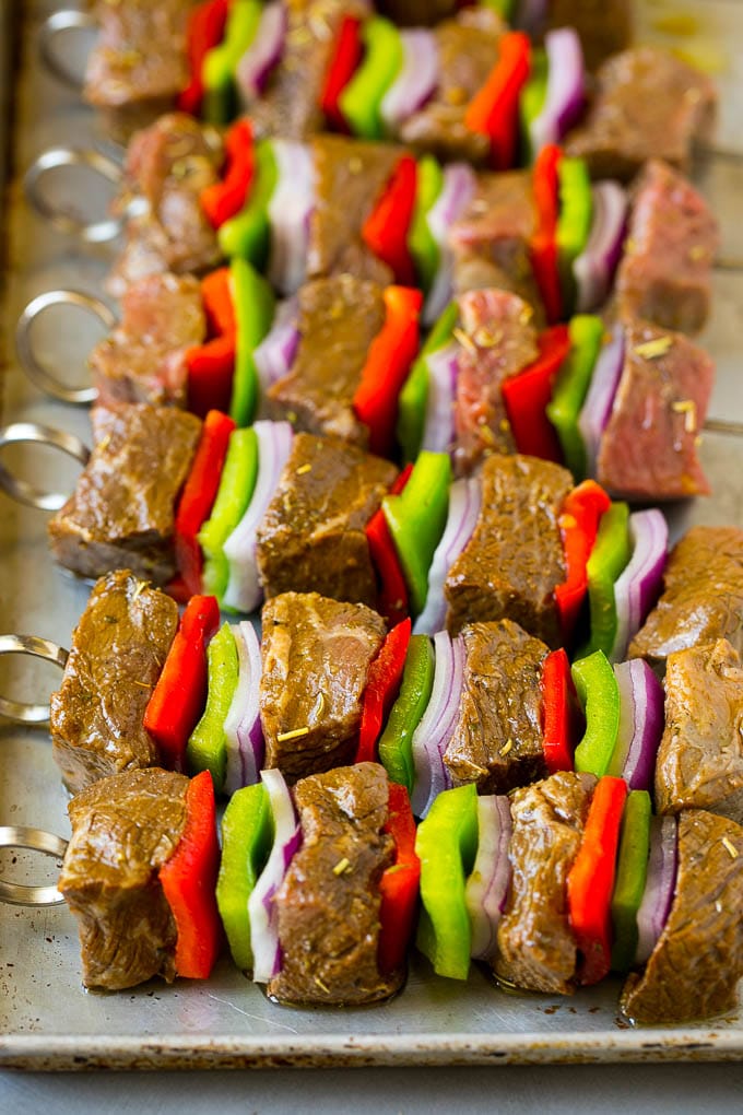 Beef Shish Kabobs Recipe | Beef Kabobs #grilling #beef #steak #dinner #edsug #peppers Raw beef skewered with peppers and onions.