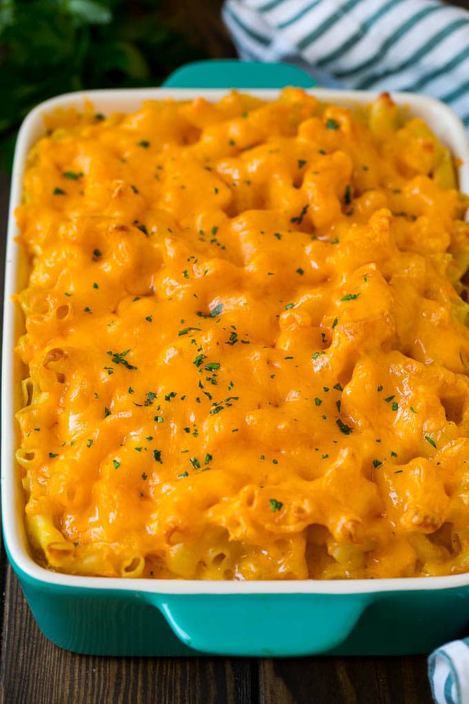 Southern Mac and Cheese | Baked Macaroni and Cheese #pasta #macandcheese #dinner #comfortfood #cheese #edsug Southern mac and cheese topped with melted cheddar and parsley.