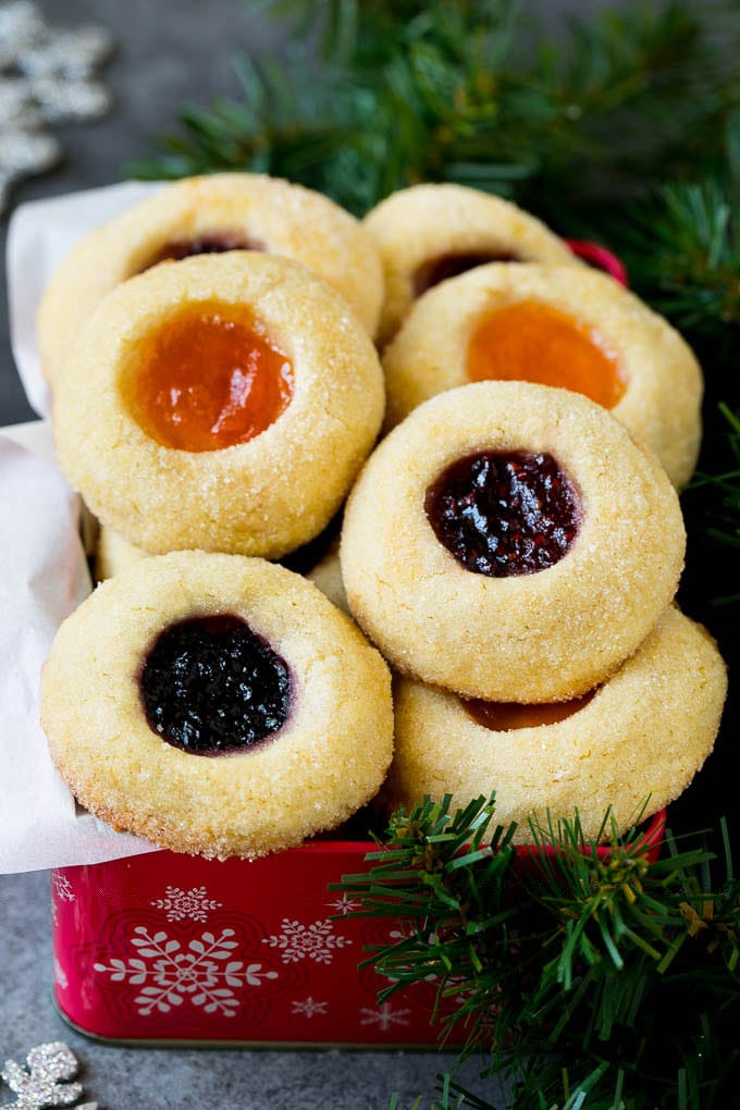 Thumbprint Cookies | Sugar Cookies #cookies #baking #christmas #dessert #edsug Thumbprint cookies in a tin for gift giving.