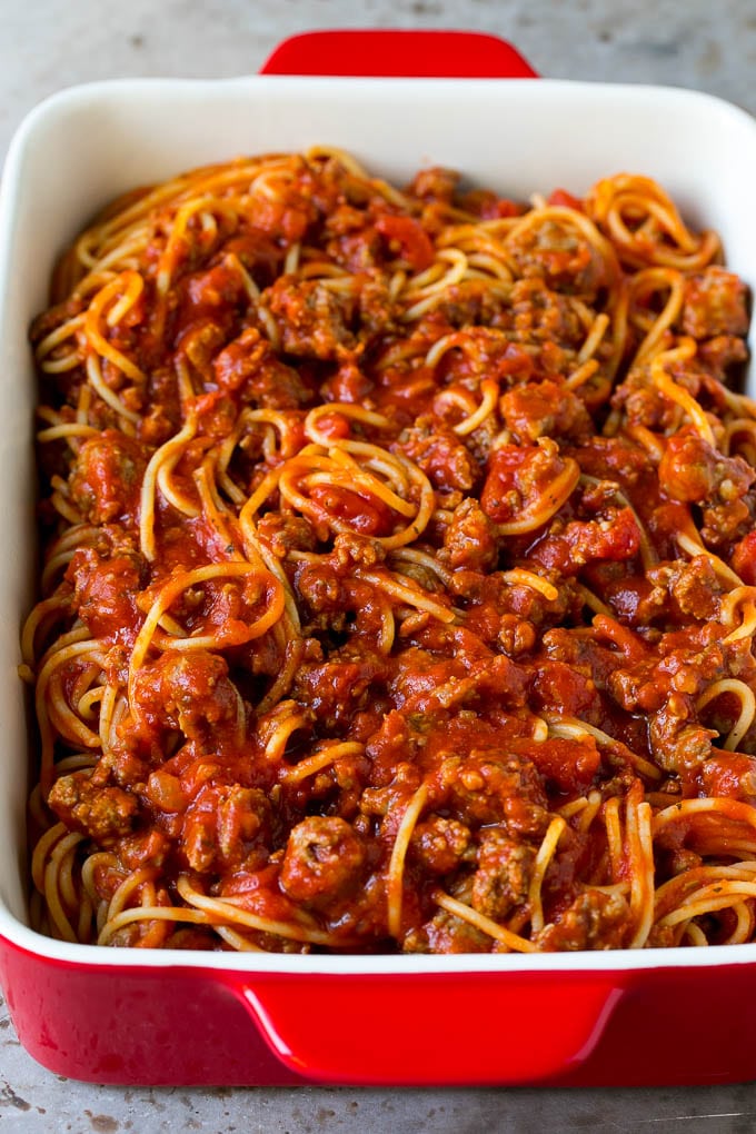 Baked Spaghetti Recipe | Baked Pasta #spaghetti #pasta #cheese #casserole #beef #sausage #dinner #edsug Pasta tossed with meat sauce in a dish.