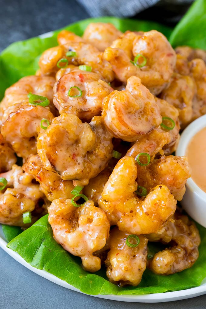 Bang Bang Shrimp Recipe | Fried Shrimp #shrimp #appetizer #dinner #edsug #copycatrecipe Bang bang shrimp tossed in creamy chili sauce and served over lettuce.