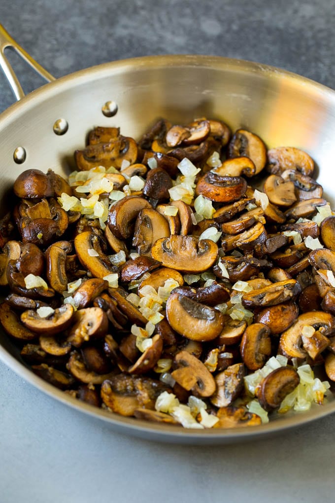 Chicken Stroganoff Recipe | Chicken and Mushrooms #chicken #mushrooms #stroganoff #dinner #edsug Sauteed mushrooms and onions in a skillet.