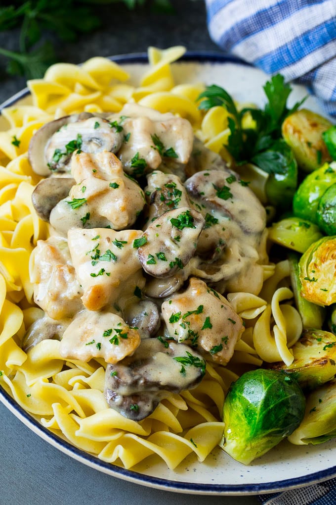 Chicken Stroganoff Recipe | Chicken and Mushrooms #chicken #mushrooms #stroganoff #dinner #edsug Chicken stroganoff over egg noodles with brussels sprouts on the side.
