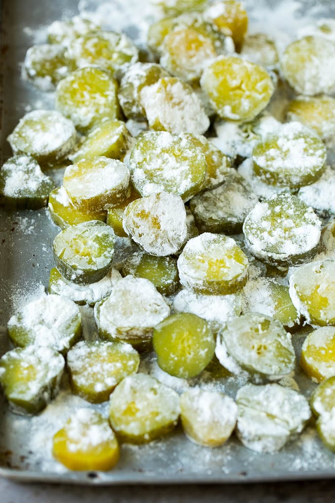 Fried Pickles Recipe #pickles #appetizer #snack #edsug Pickle slices coated in flour.