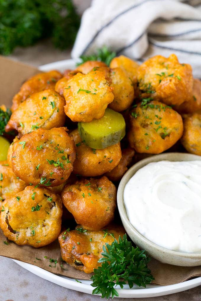 Fried Pickles Recipe #pickles #appetizer #snack #edsug A plate of fried pickles, served with ranch dip.