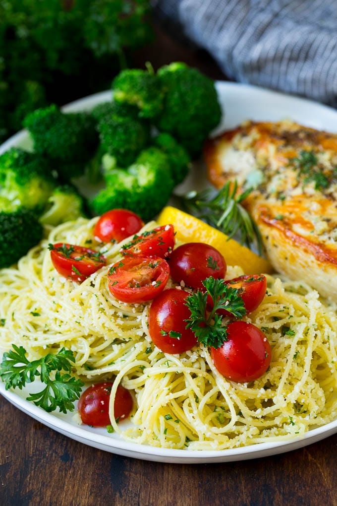 Garlic and Herb Angel Hair Pasta #pasta #garlic #sidedish #dinner #edsug Angel hair pasta served with chicken and broccoli.