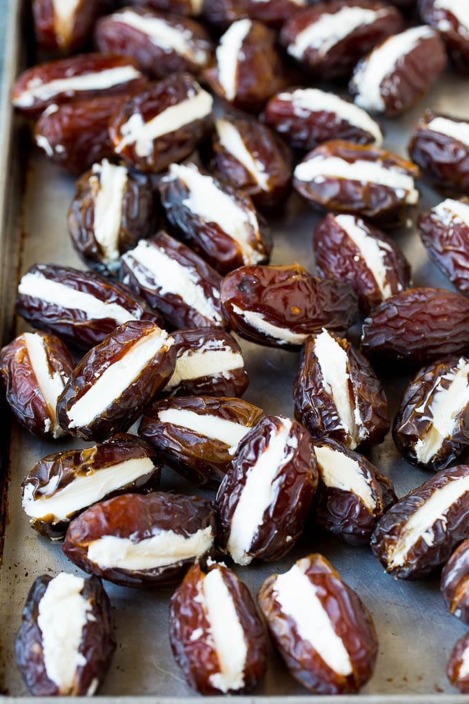 Bacon Wrapped Dates #appetizer #bacon #dates #cheese #edsug Dates cut in half and filled with goat cheese.