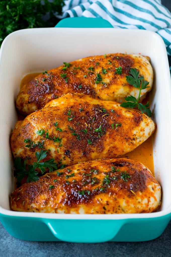 Baked Chicken Breast Recipe #chicken #dinner #edsug Baked chicken breast topped with fresh chopped parsley.
