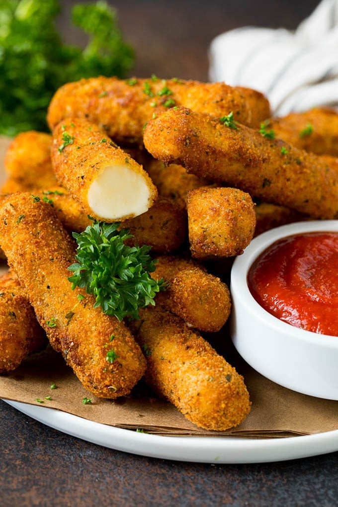 Mozzarella Sticks Recipe #cheese #appetizer #edsug Mozzarella sticks served with a side of marinara sauce.