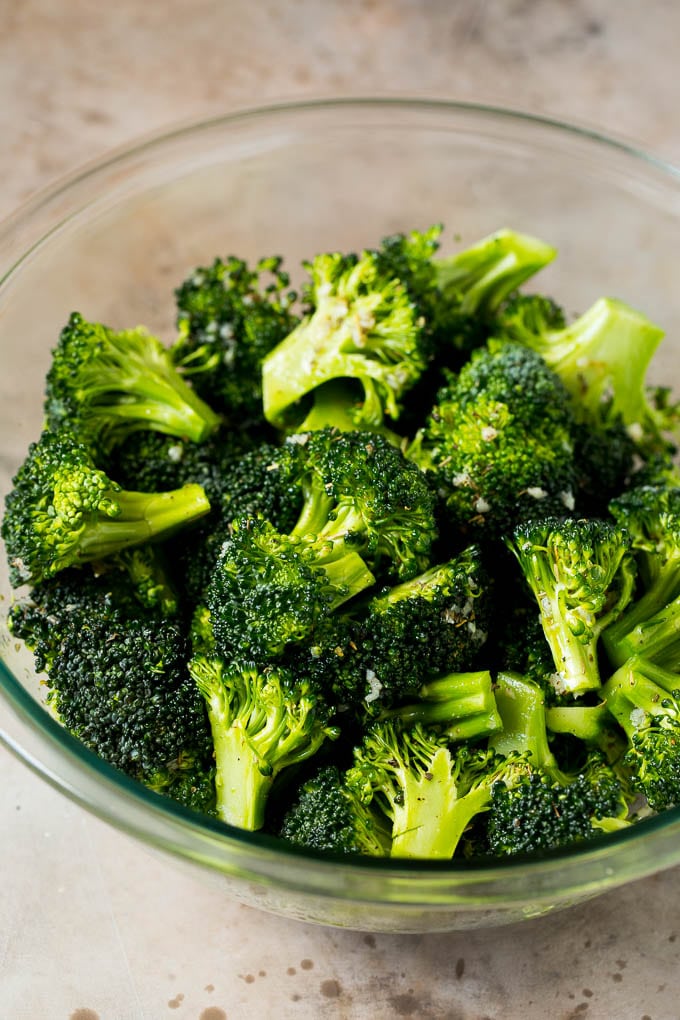 Grilled broccoli is packed with flavor and is a colorful and healthy side dish! #broccoli #edsug Florets tossed with olive oil, garlic and herbs.