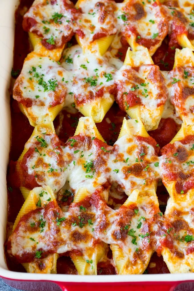 Baked stuffed shells filled with three types of cheese and topped with marinara sauce. #pasta #edsug Baked stuffed shells filled with three types of cheese and topped with marinara sauce.