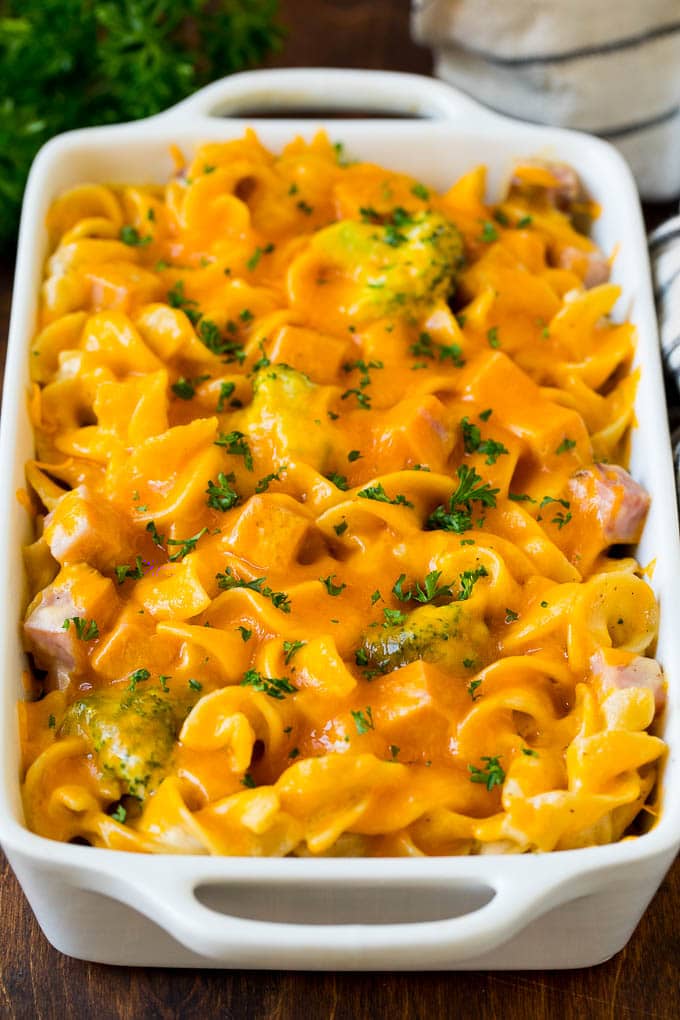 This ham casserole is egg noodles, broccoli and diced ham in a creamy sauce, all topped with cheese and baked to golden brown perfection. Ham casserole with egg noodles and broccoli, topped with melted cheese.
