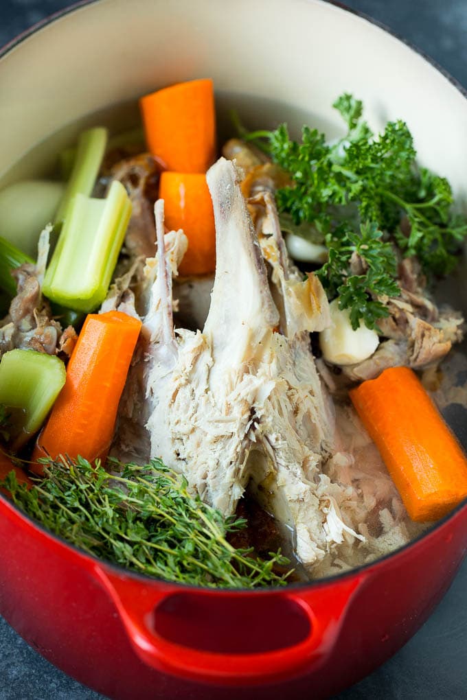 This turkey soup recipe is homemade turkey broth loaded with vegetables, diced turkey and egg noodles. A bones, meat and vegetables in a pot of water to make broth.