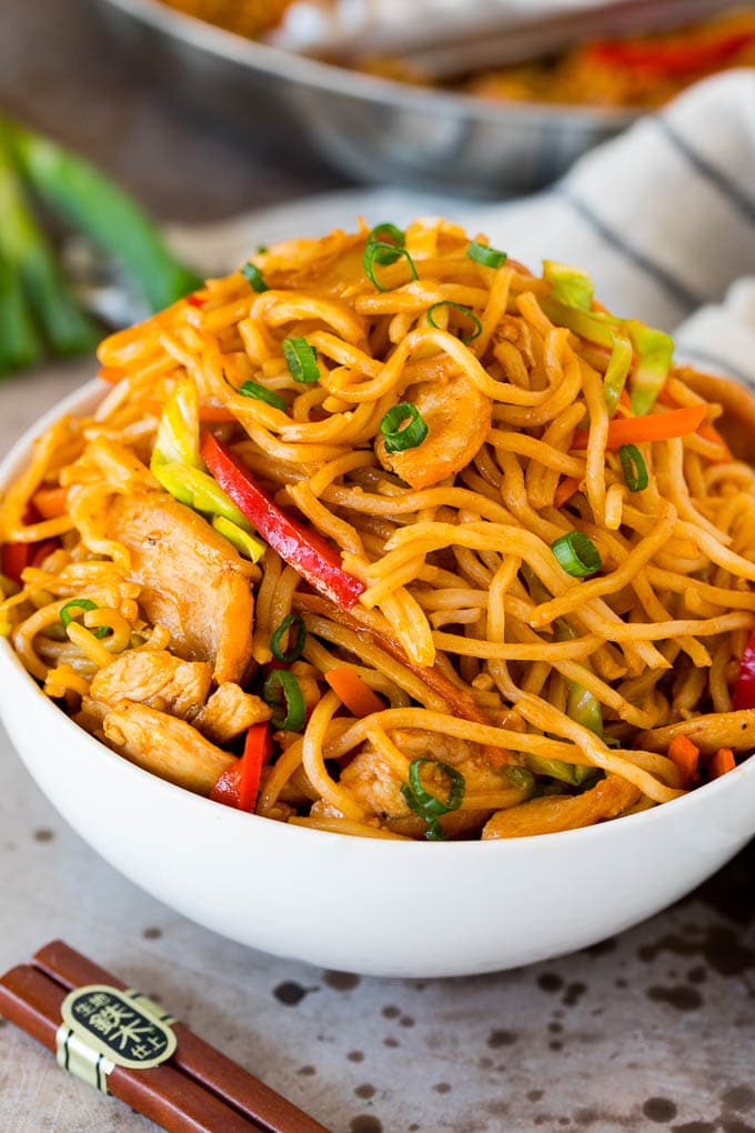 These yakisoba noodles are tender noodles stir fried with chicken and assorted vegetables in a savory sauce. A bowl of chicken yakisoba noodles.