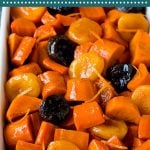 This tzimmes recipe is a colorful stew made with sweet potatoes, carrots and dried fruit.