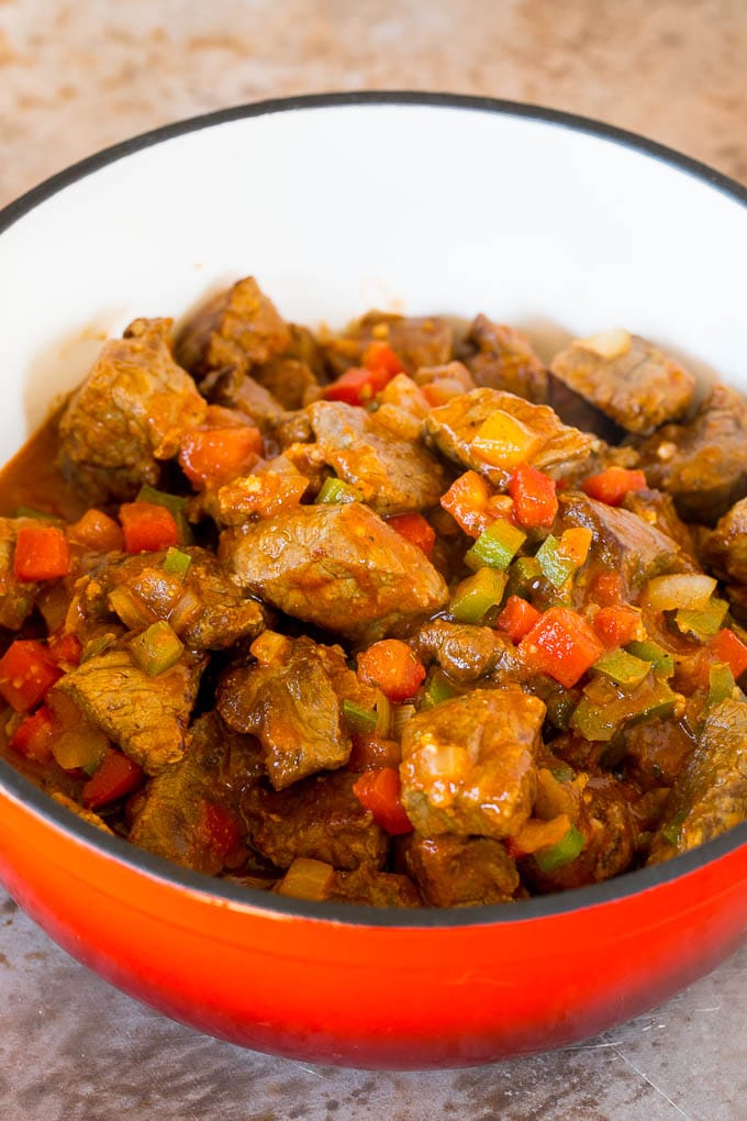 This Mexican style carne guisada is beef that is stewed with tomatoes, peppers and spices until it becomes tender and flavorful. Beef chunks with tomatoes, peppers and onions.