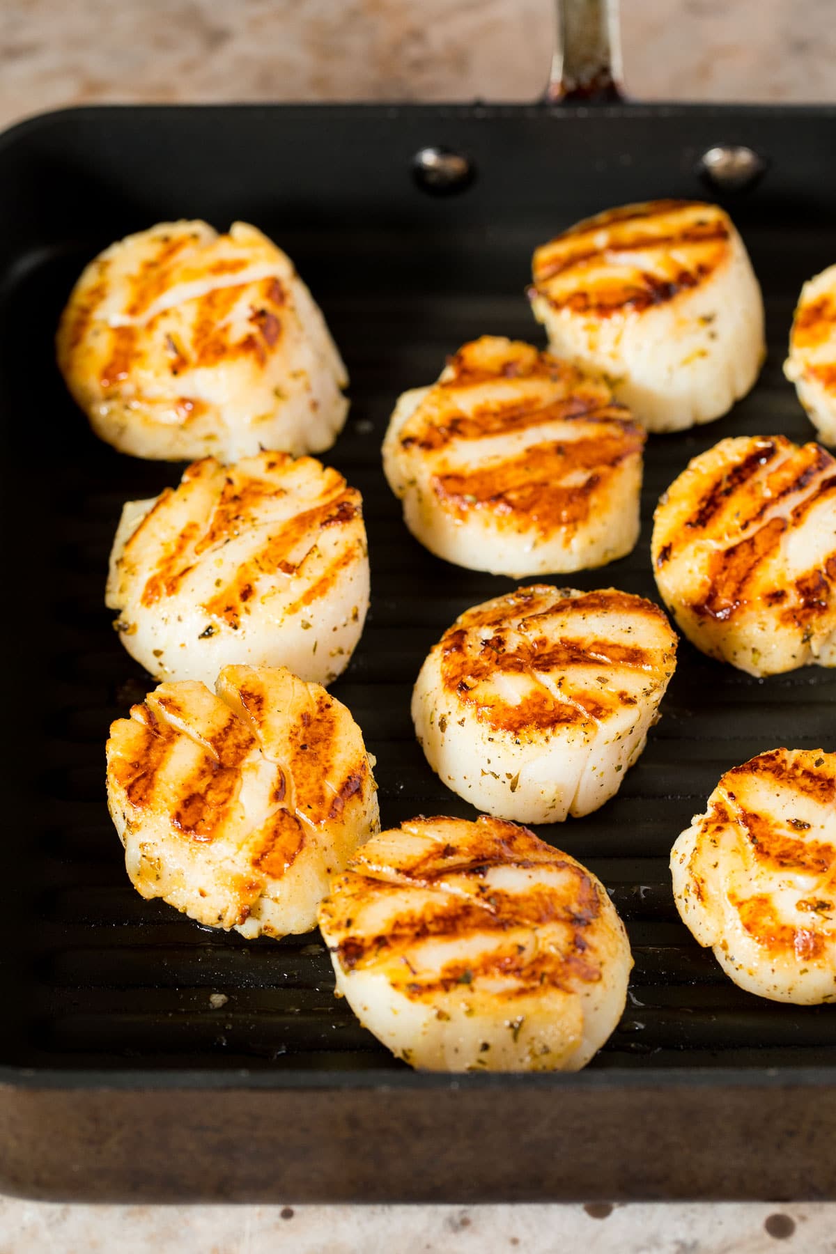 Shellfish seared on a pan.