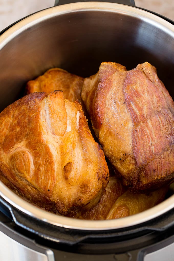 Seared pork in a pressure cooker.