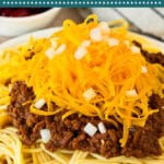 This Cincinnati chili recipe features a hearty meat sauce that is flavored with tomatoes and spices, then simmered to perfection.