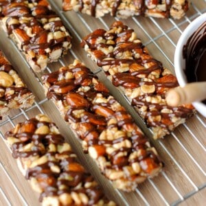 An image of several granola bars on a wire rack.
