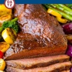 This smoked tri tip is a tender beef roast coated in a homemade spice rub, then slow smoked to perfection.