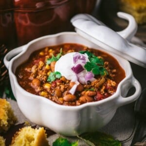 An image of a pumpkin shaped pot of pumpkin chili.