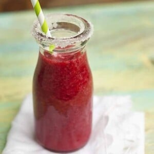 An image of a small bottle of raspberry lemonade.