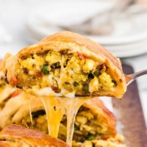 An image of a breakfast crescent ring with eggs and sausage inside.