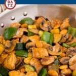 This almond chicken is a stir fry of chicken thigh pieces, assorted vegetables and crunchy almonds, all tossed in a savory sauce.