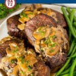 This Steak Diane recipe is beef tenderloin medallions that are seared and coated in a savory mushroom sauce.