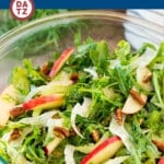 This fennel salad is a blend of arugula, fresh apples, thinly sliced fennel, celery and candied pecans, all tossed together in a homemade dressing.